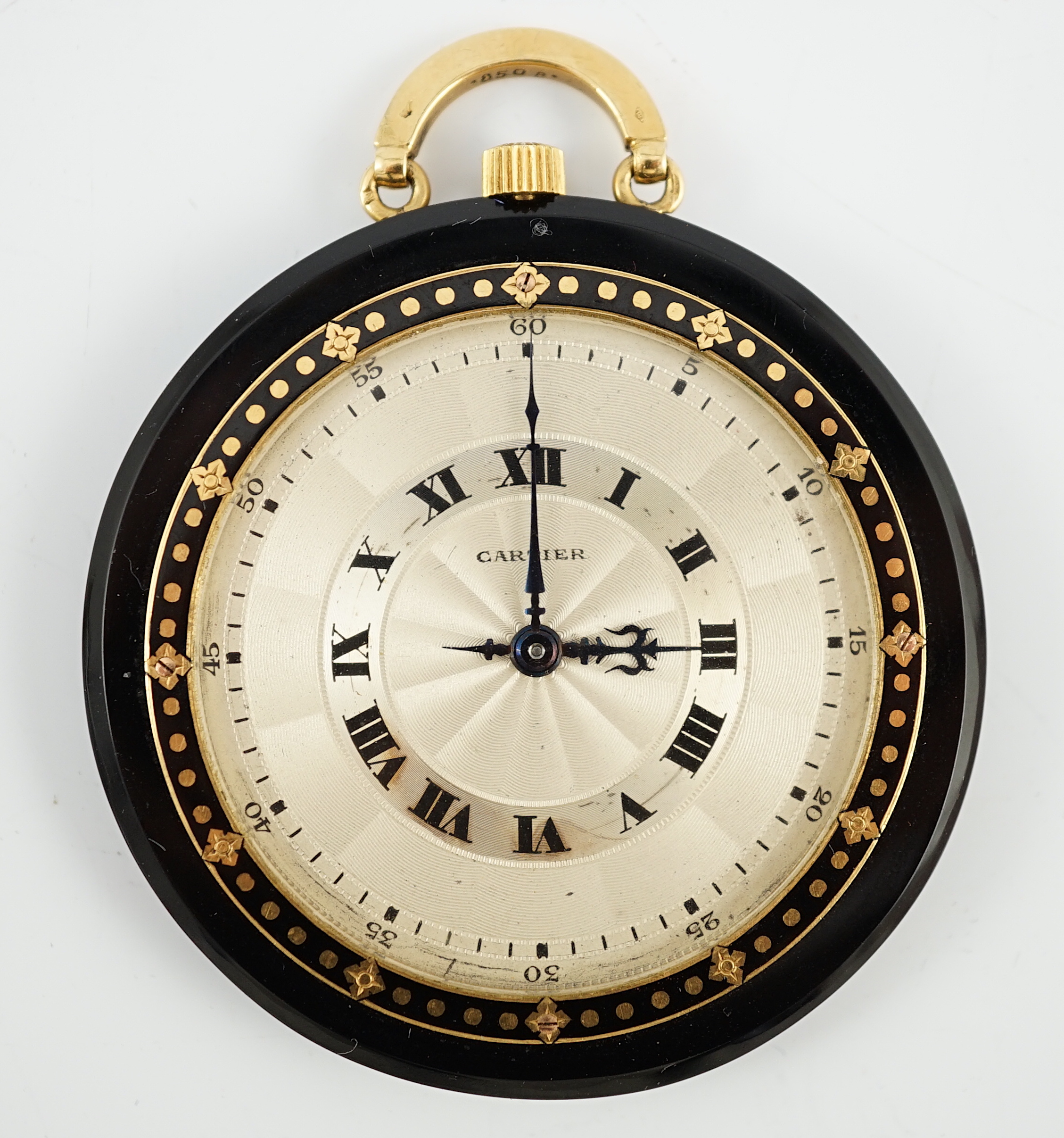 A good 1920's French Cartier black onyx, enamel and 18ct gold circular pocket watch